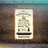 Camping rules sign with illustrations: campfire, birds, lake, book, sunset, and fresh air.