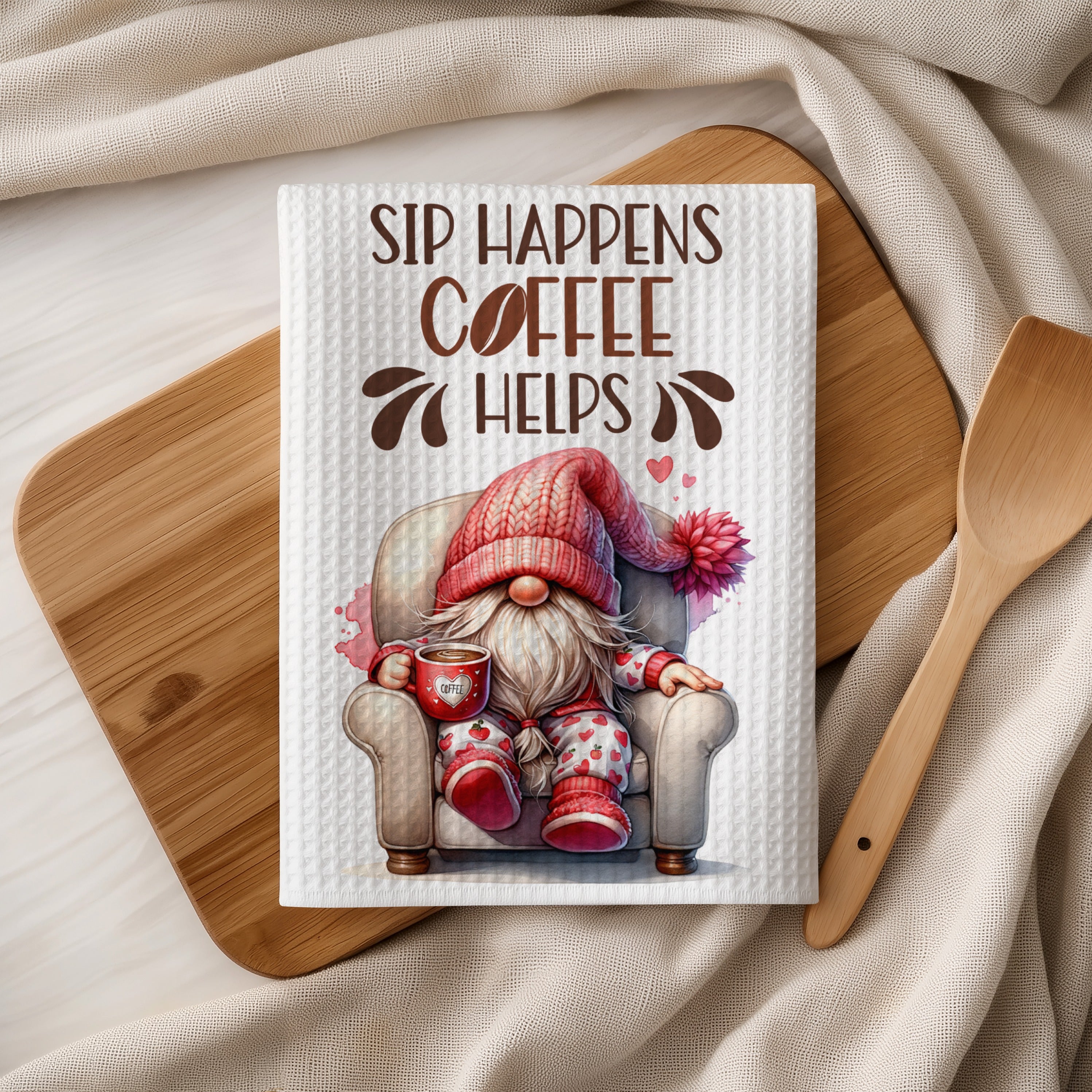 Gnome in armchair with coffee mug, "Sip Happens Coffee Helps" text.