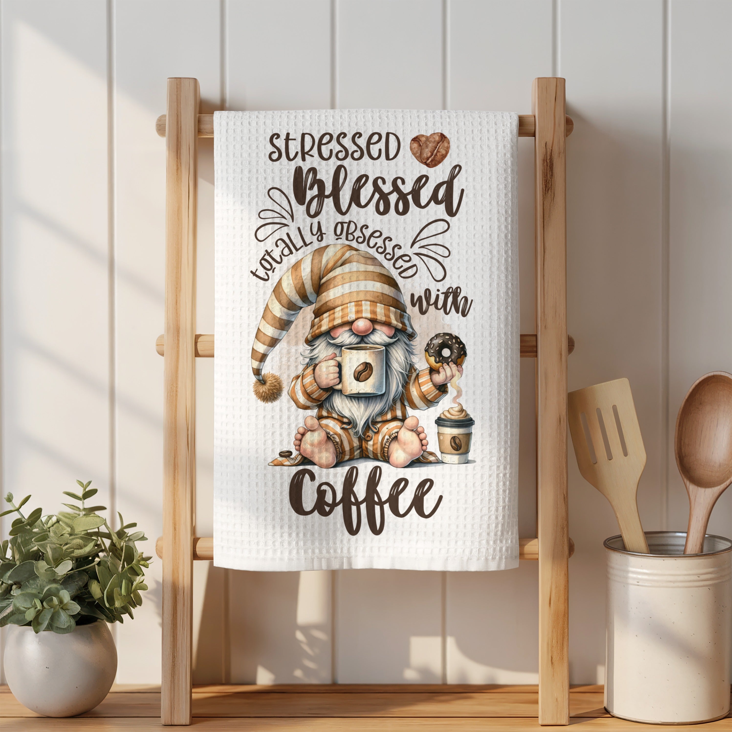 Gnome holding coffee cup and donut, text reads "Stressed blessed totally obsessed with coffee".