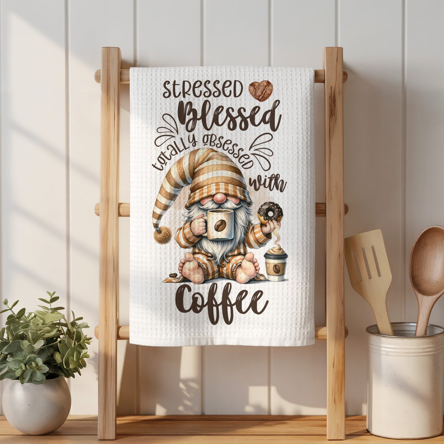 Gnome holding coffee cup and donut, text reads "Stressed blessed totally obsessed with coffee".