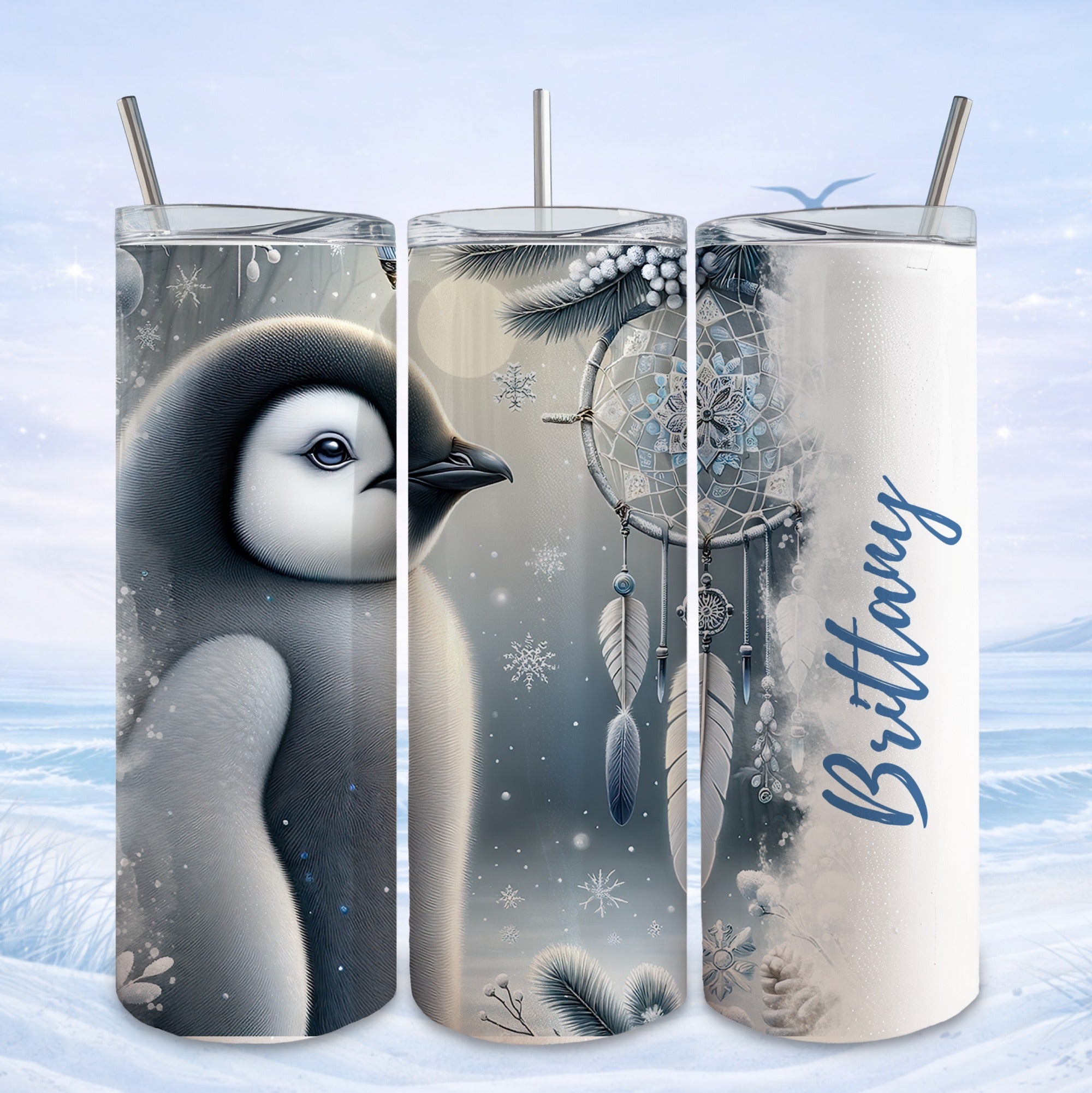 Penguin, dreamcatcher, and "Brittany" text on three white tumblers.