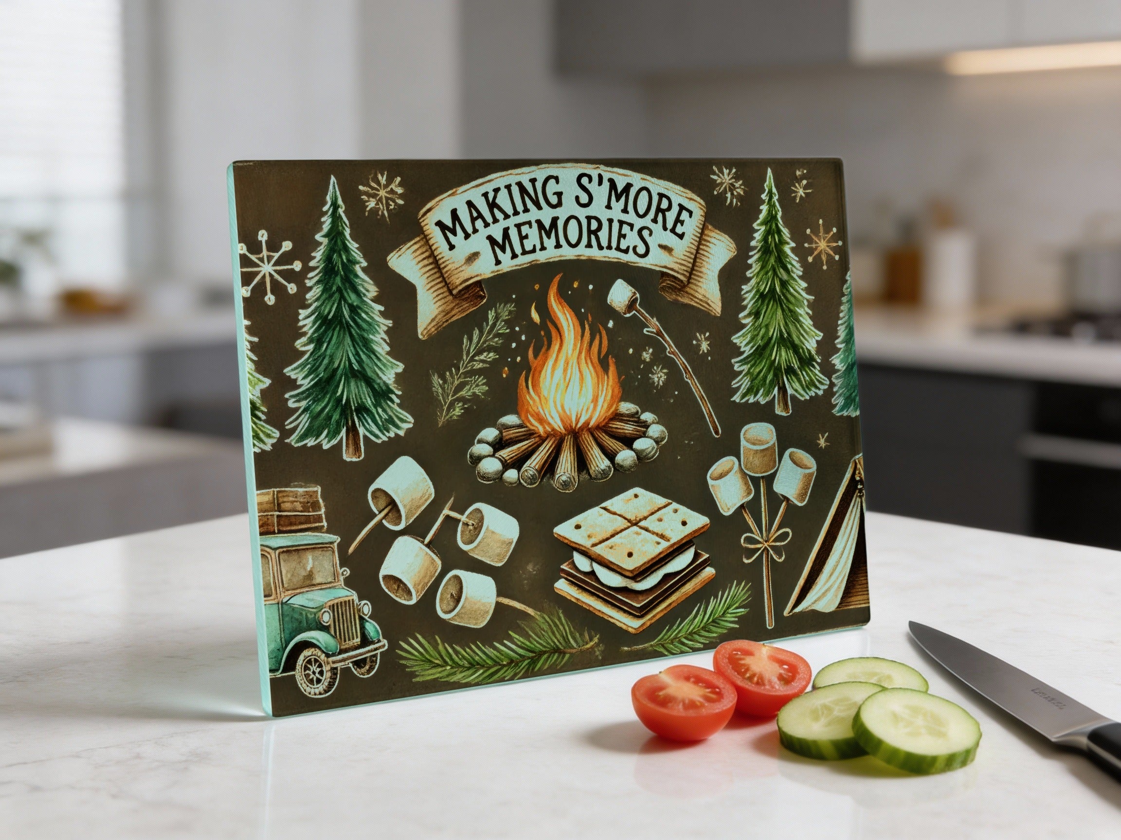 Glass cutting board with s'mores campfire scene and text "MAKING S'MORE MEMORIES."