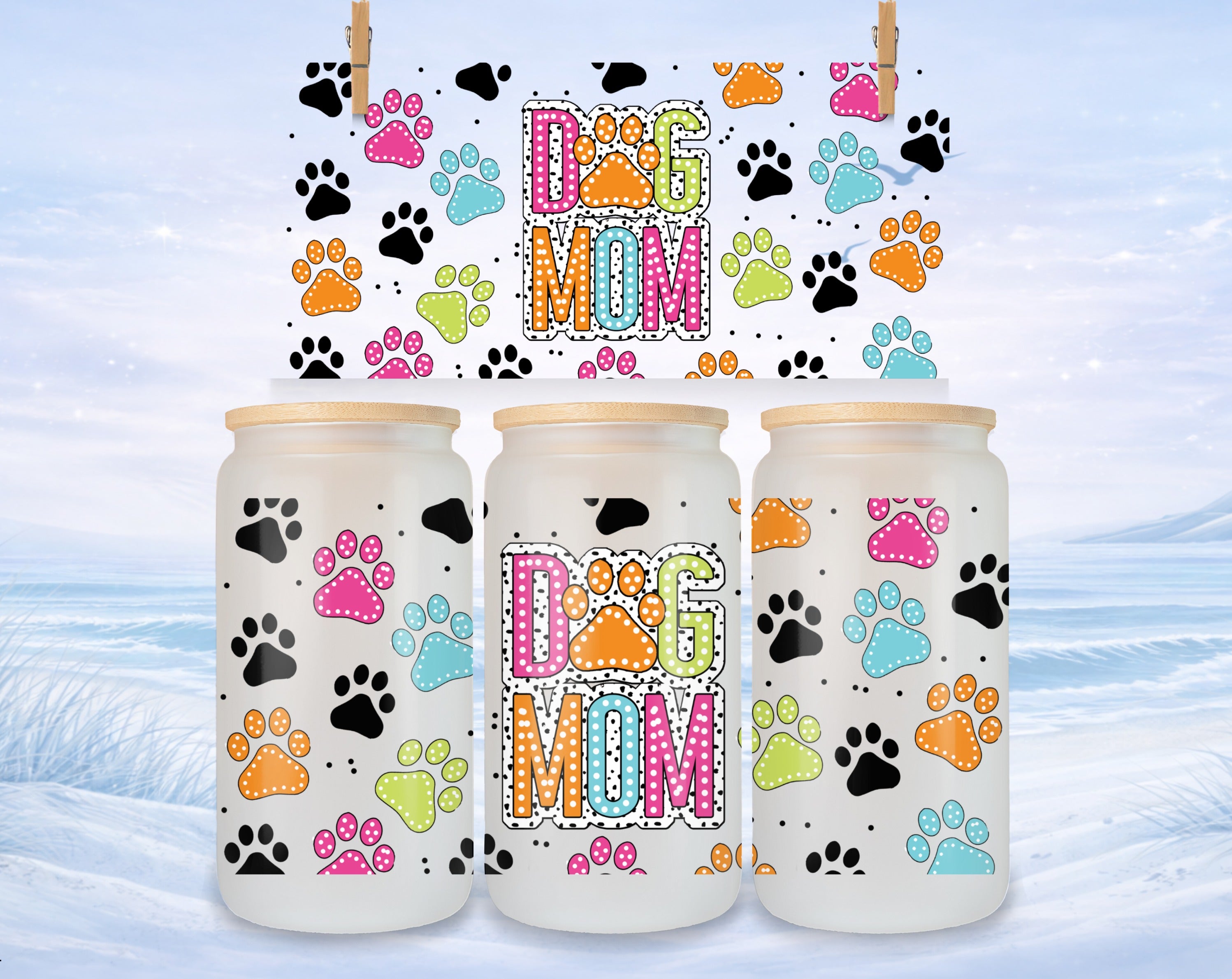 Three frosted glass tumblers with "Dog Mom" text and paw prints.