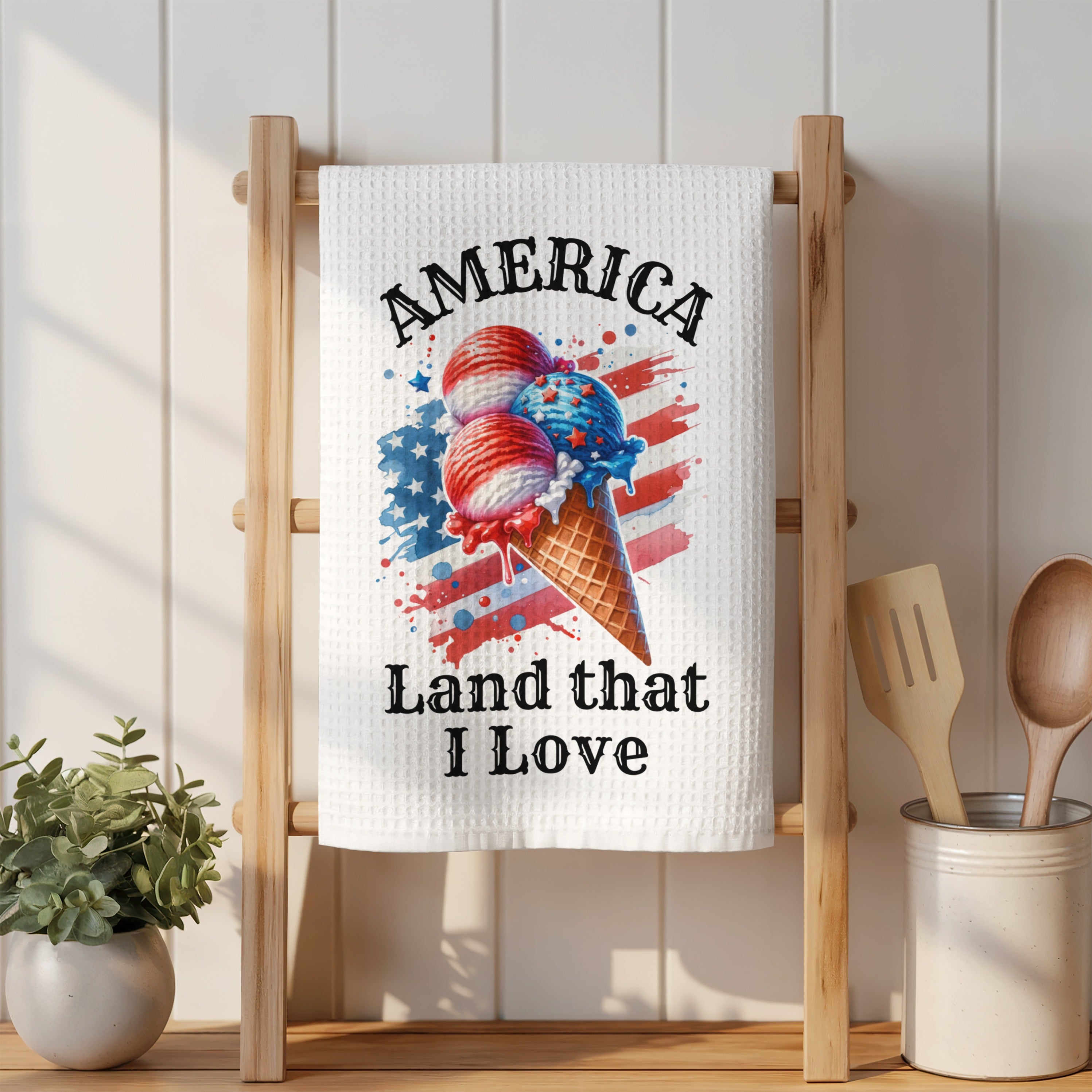 Ice cream cone with American flag colors and text "America Land That I Love".