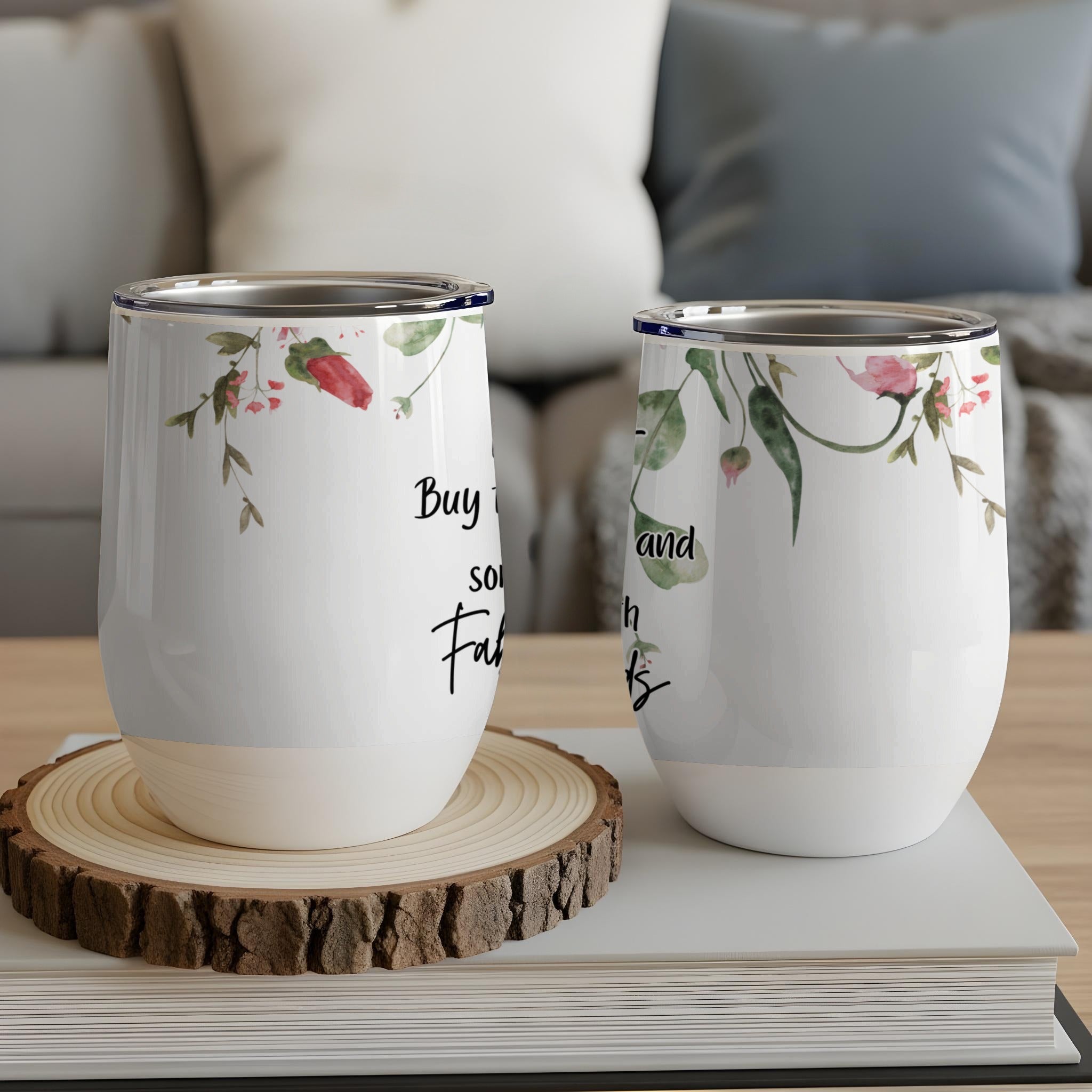 White wine tumbler with floral design and inspirational text.