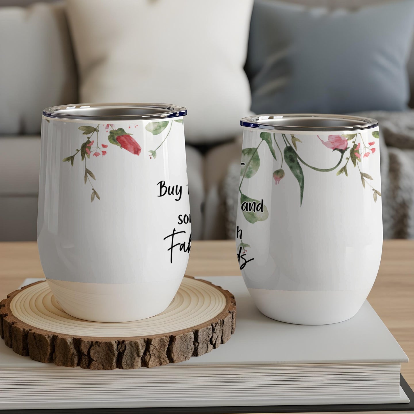 White wine tumbler with floral design and inspirational text.