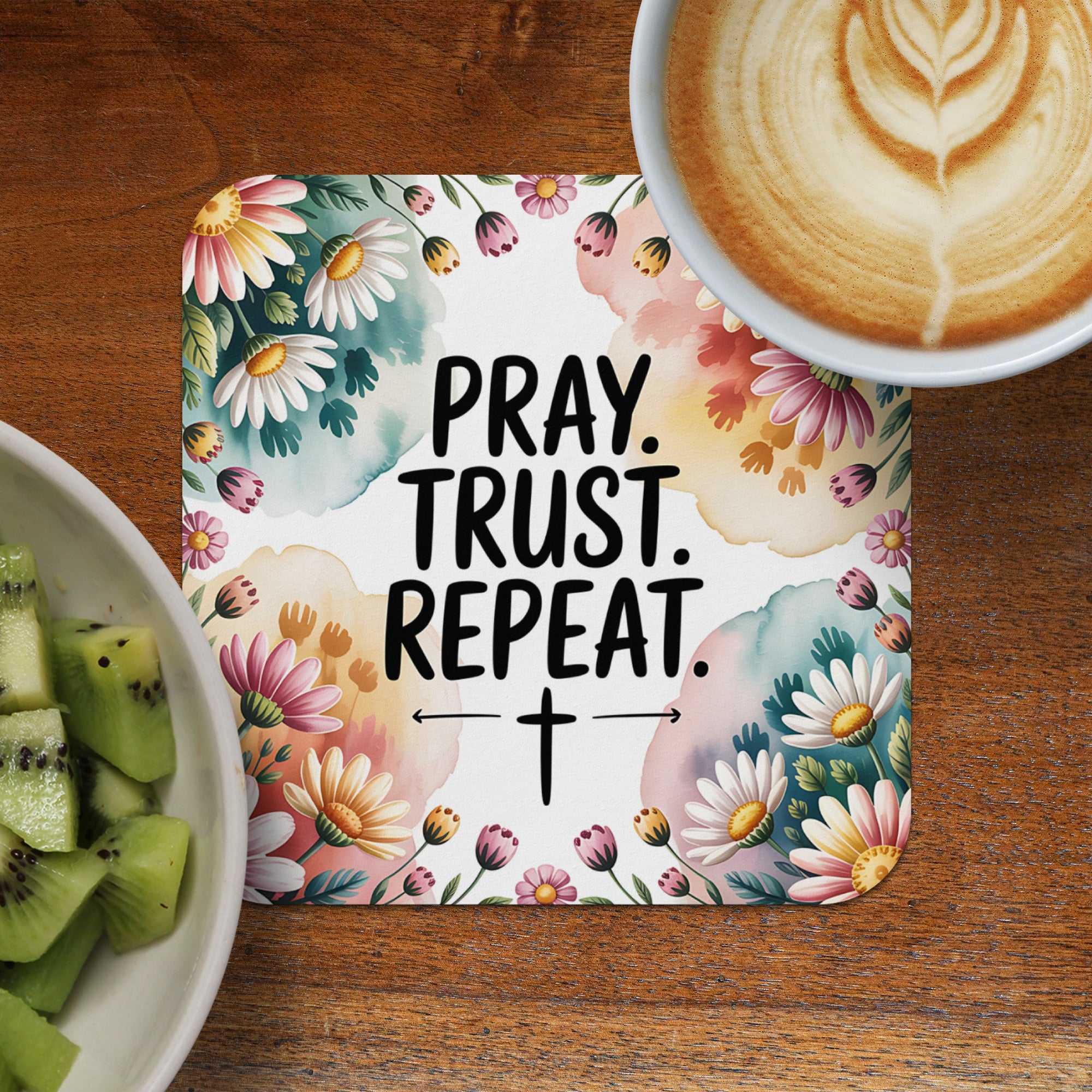 Coaster with Pray. Trust. Repeat. text and floral watercolor design.