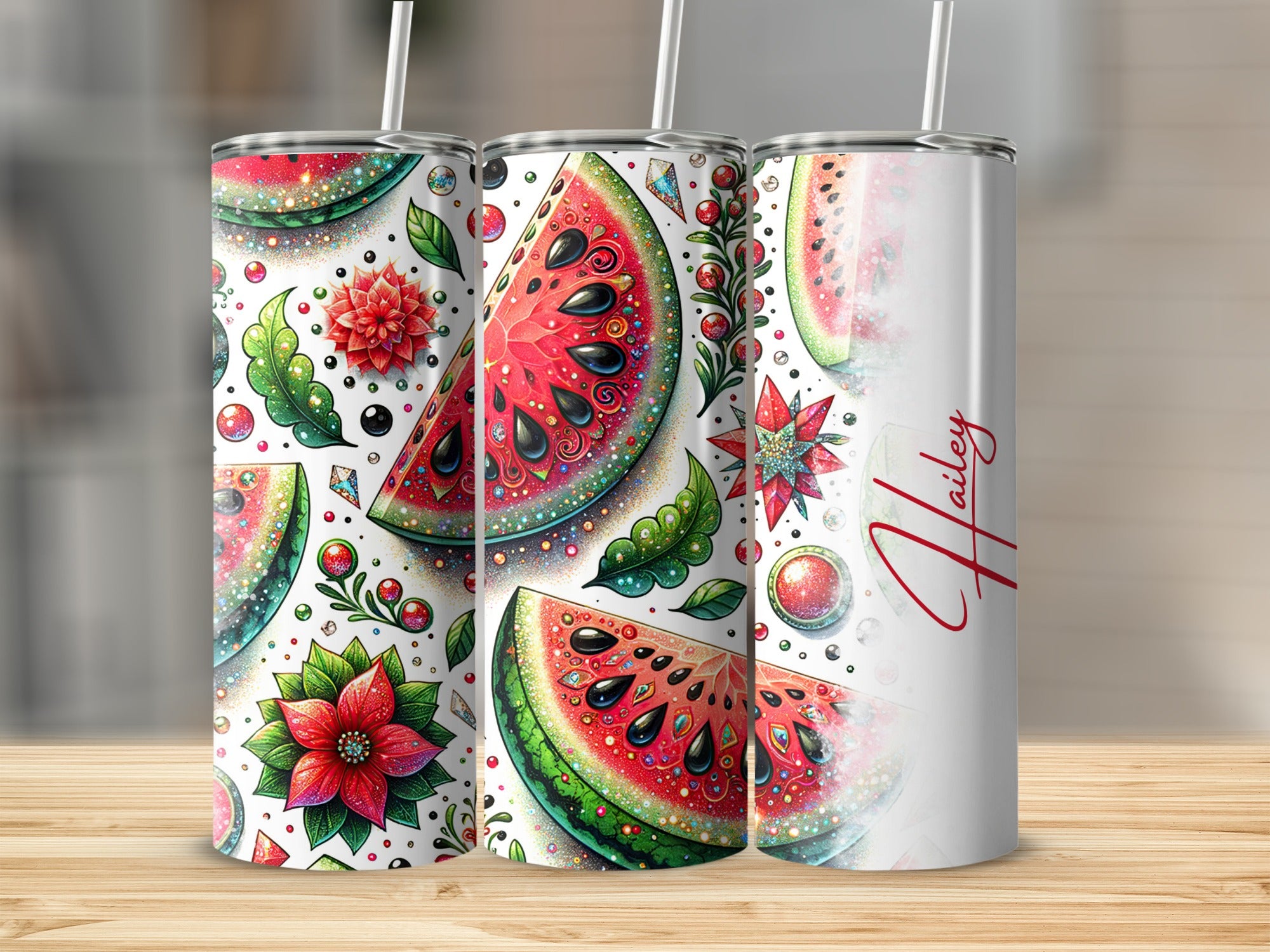 Three tumblers with watermelon slices, colorful floral accents, and glitter details.