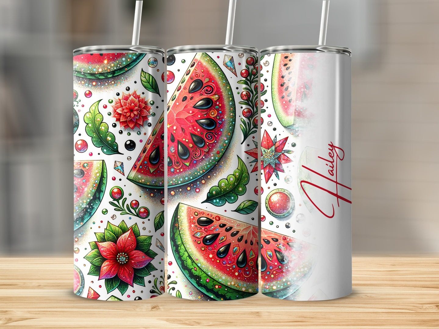 Three tumblers with watermelon slices, colorful floral accents, and glitter details.