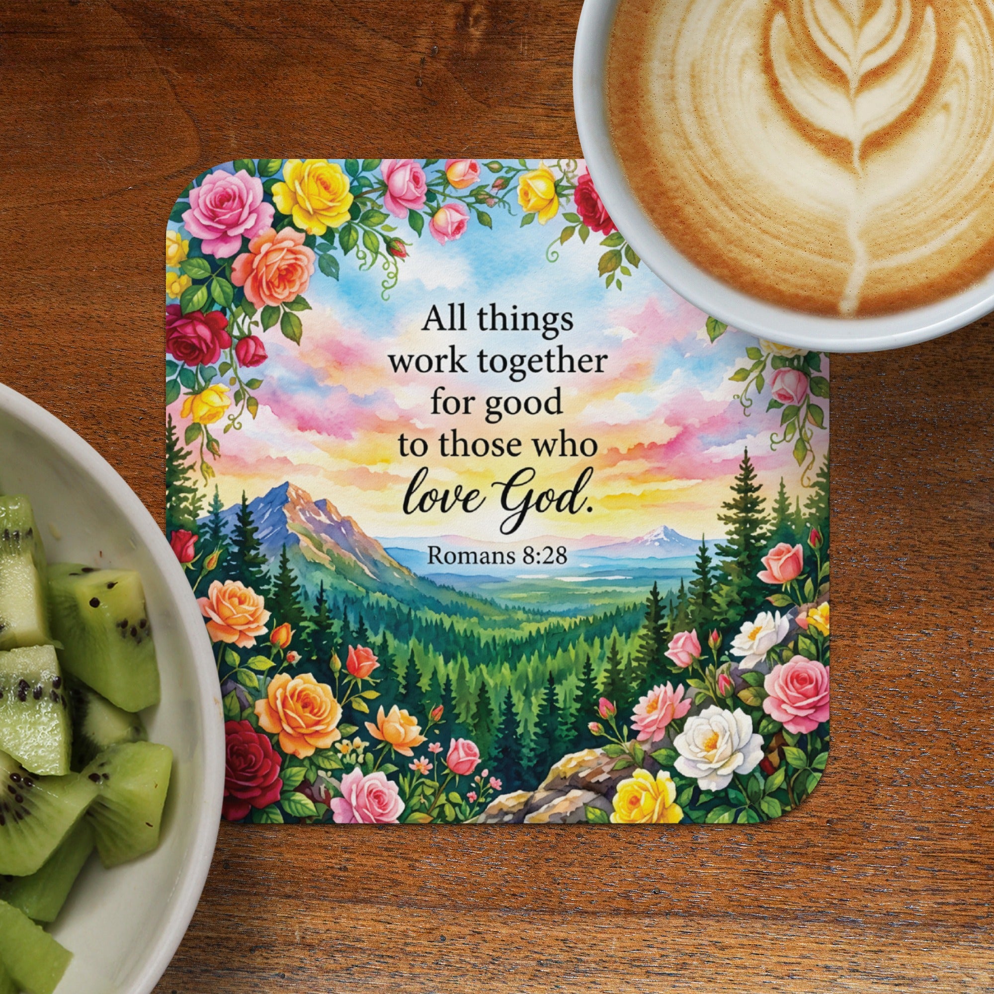Coaster with floral border, mountains, and text: "All things work together for those who love God. Romans 8:28."