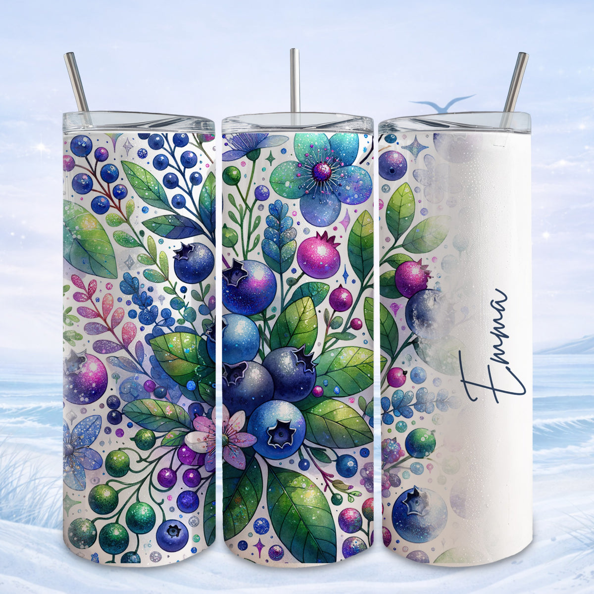 Tumbler with blueberries, leaves, and floral designs.