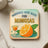 Square coaster with "Mornings Were Made For Mimosas" text, an orange slice, and a cocktail glass.
