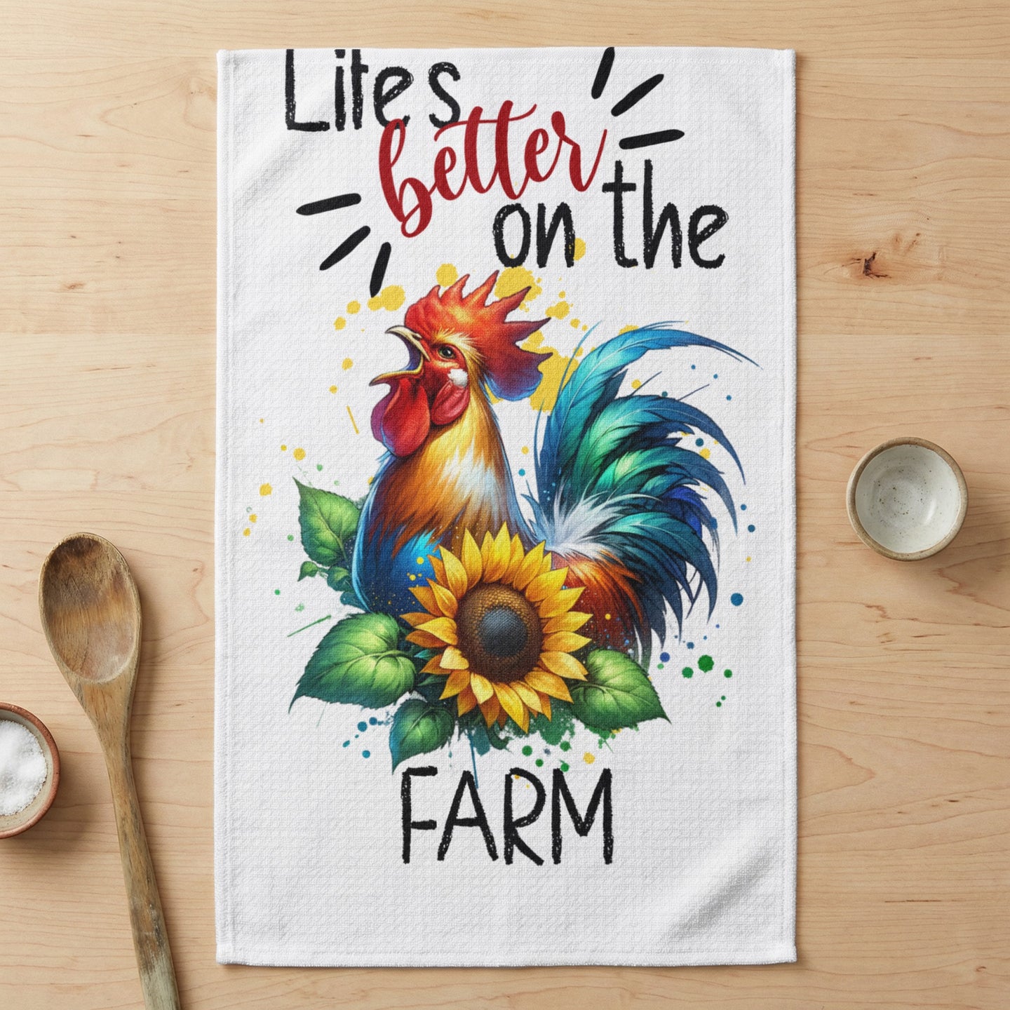 White tea towel with rooster, sunflower, and text "Life's better on the farm".