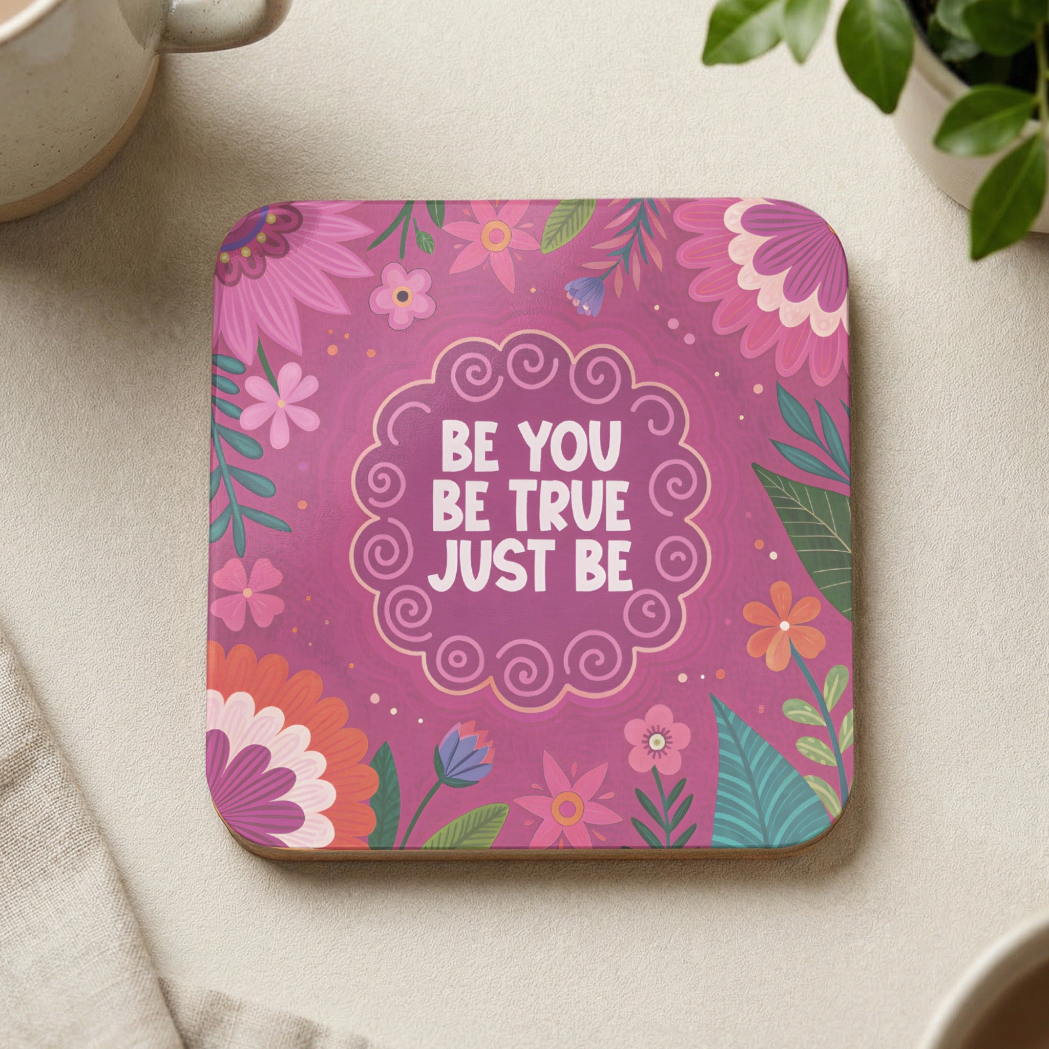 Square coaster with floral design and text "BE YOU BE TRUE JUST BE".