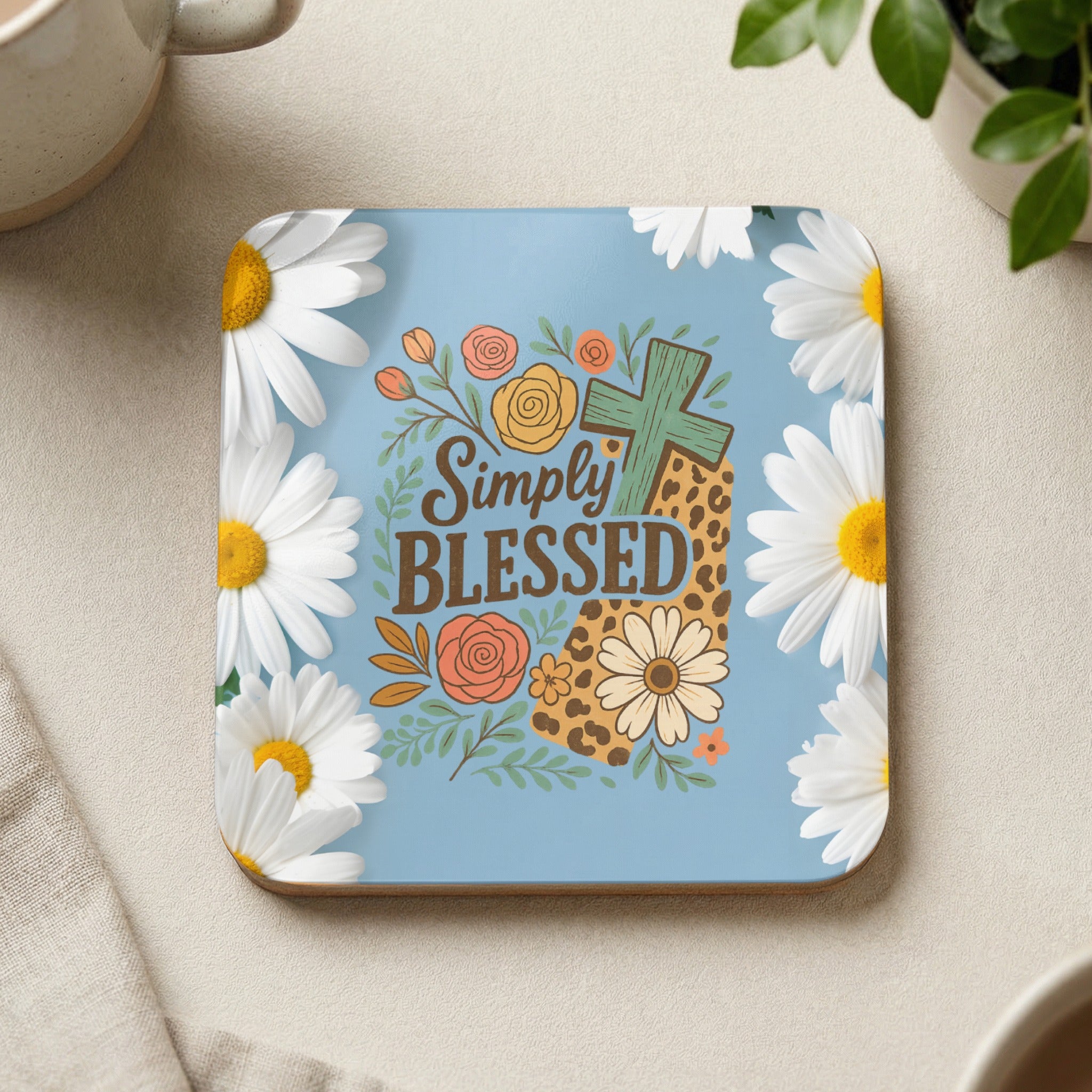 Simply Blessed cross with flowers and leopard print design on blue coaster.
