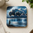 Native American figure watches stormy skies with buffalo made of clouds.