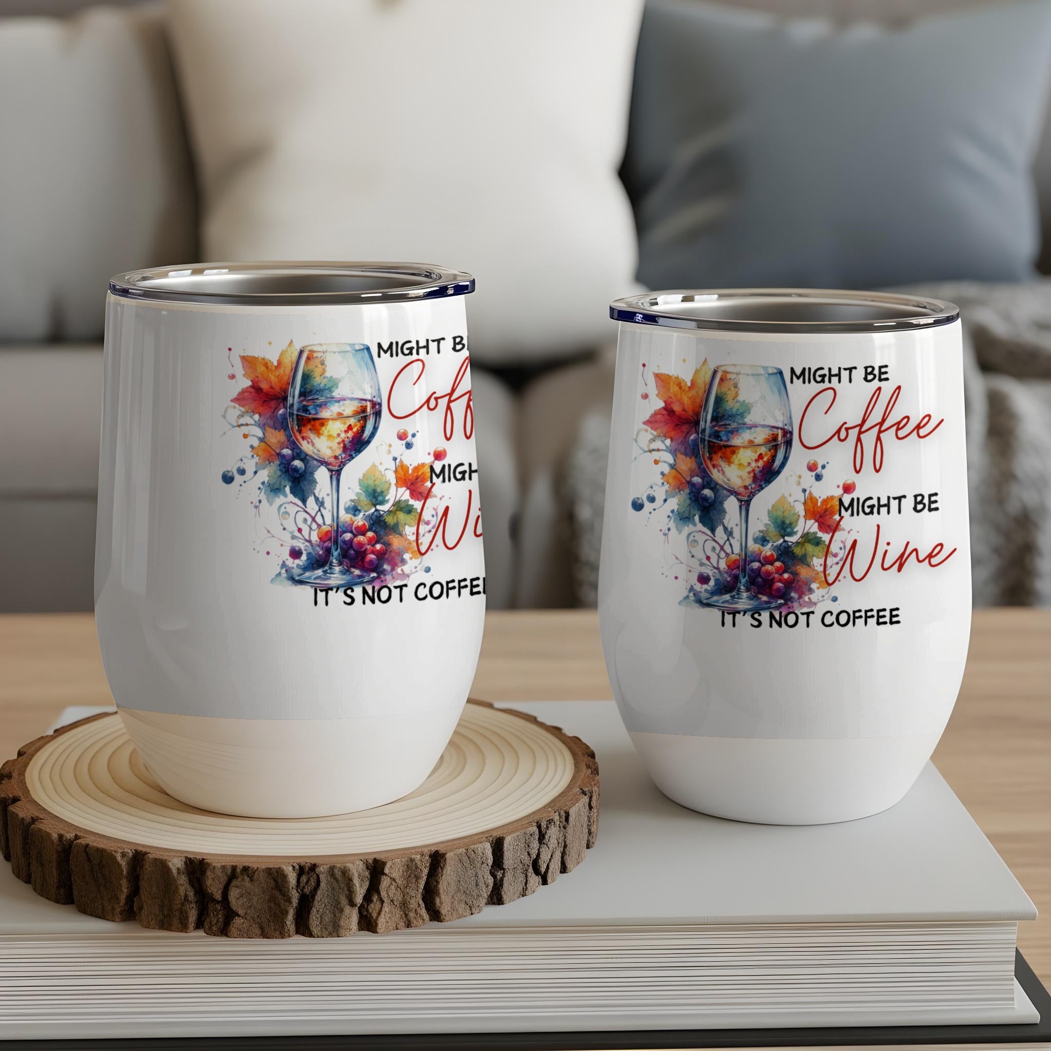 Two wine tumblers with "Might be Coffee, Might be Wine" text and watercolor grapes.