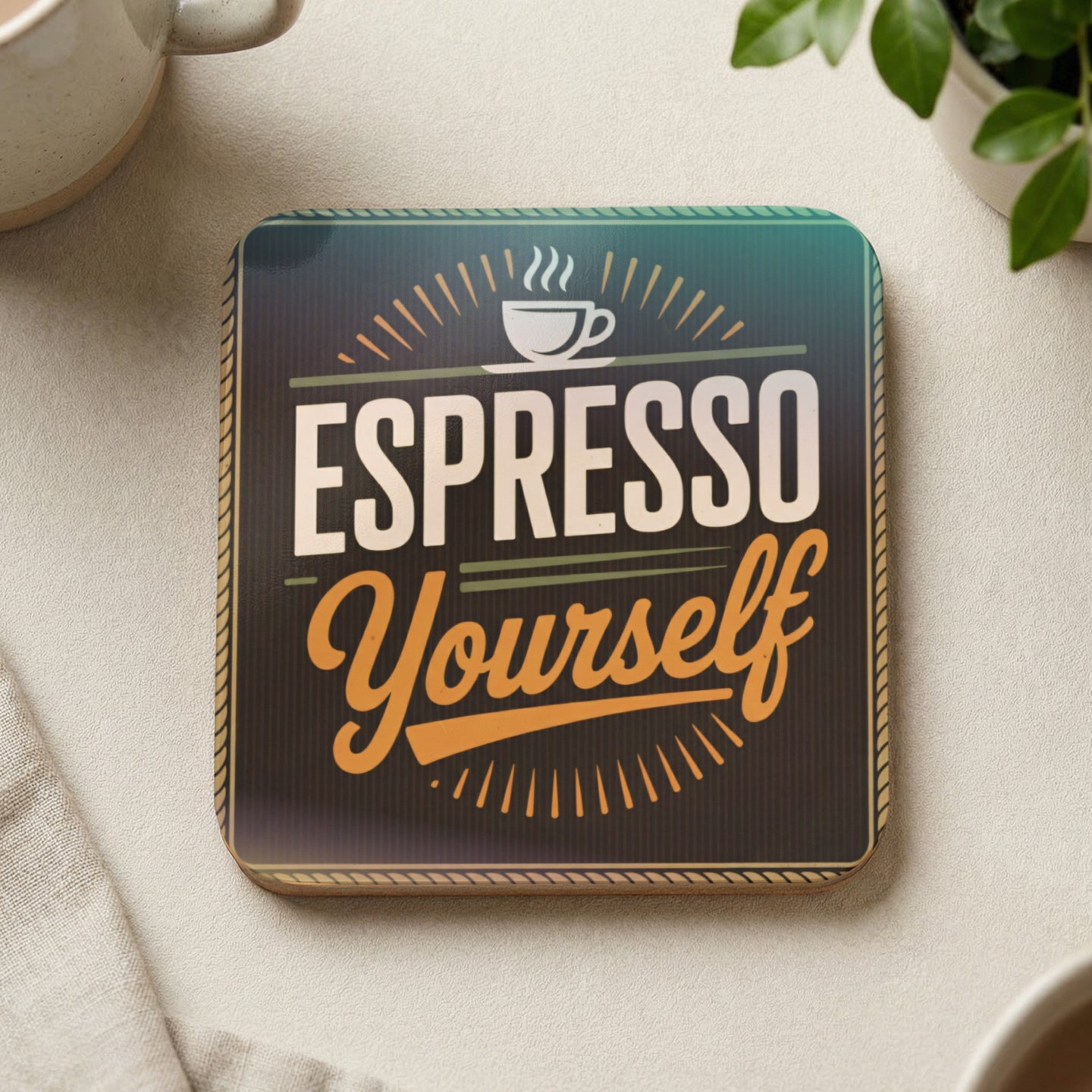 Espresso Yourself text on a square coaster with a decorative border.