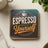 Espresso Yourself text on a square coaster with a decorative border.