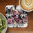 Woman with skull bandana, wolves, roses, and "Continue" text.