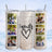 Collage of family photos within wooden frame on beach background.