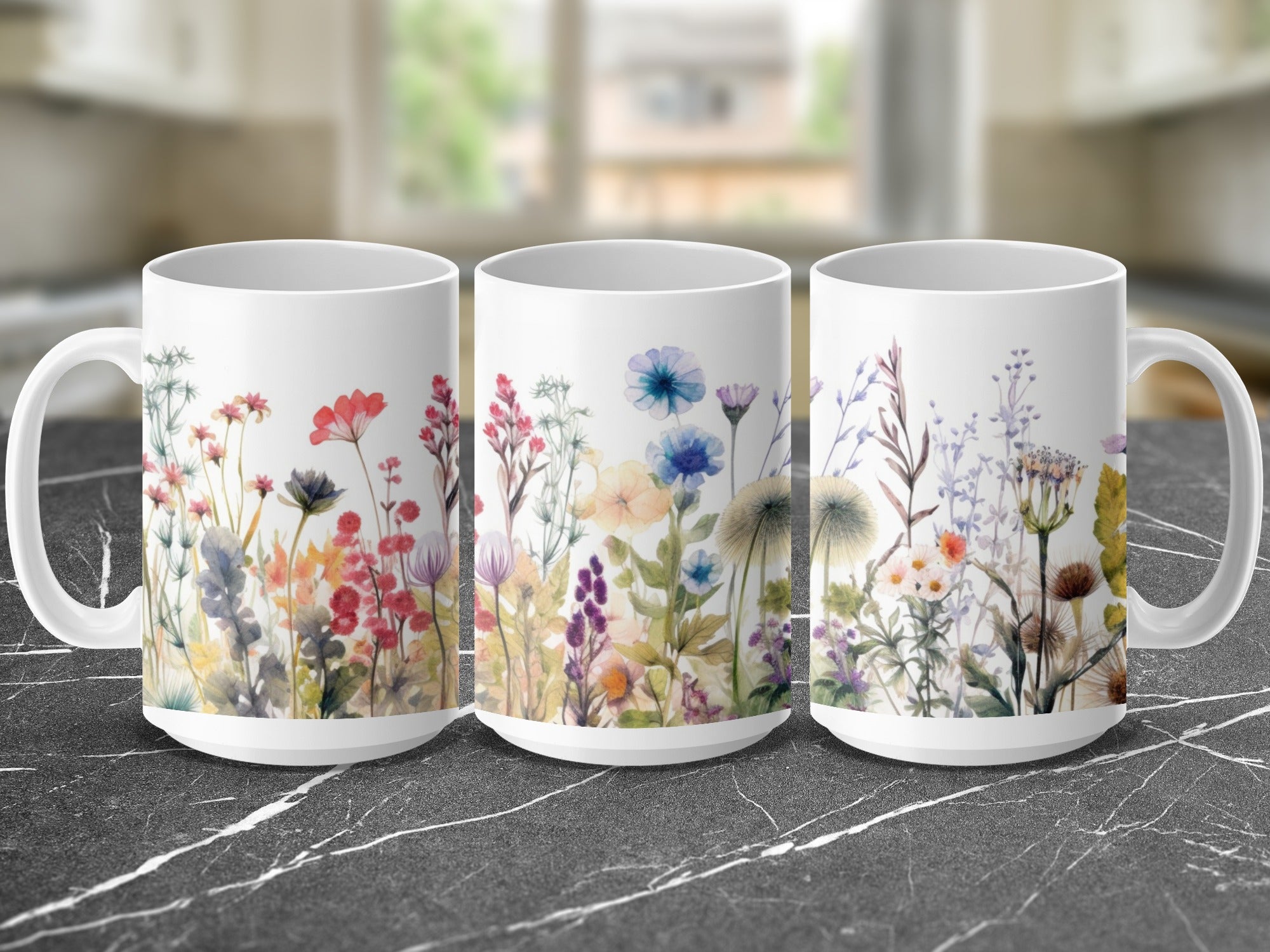 Three white mugs adorned with watercolor floral designs.