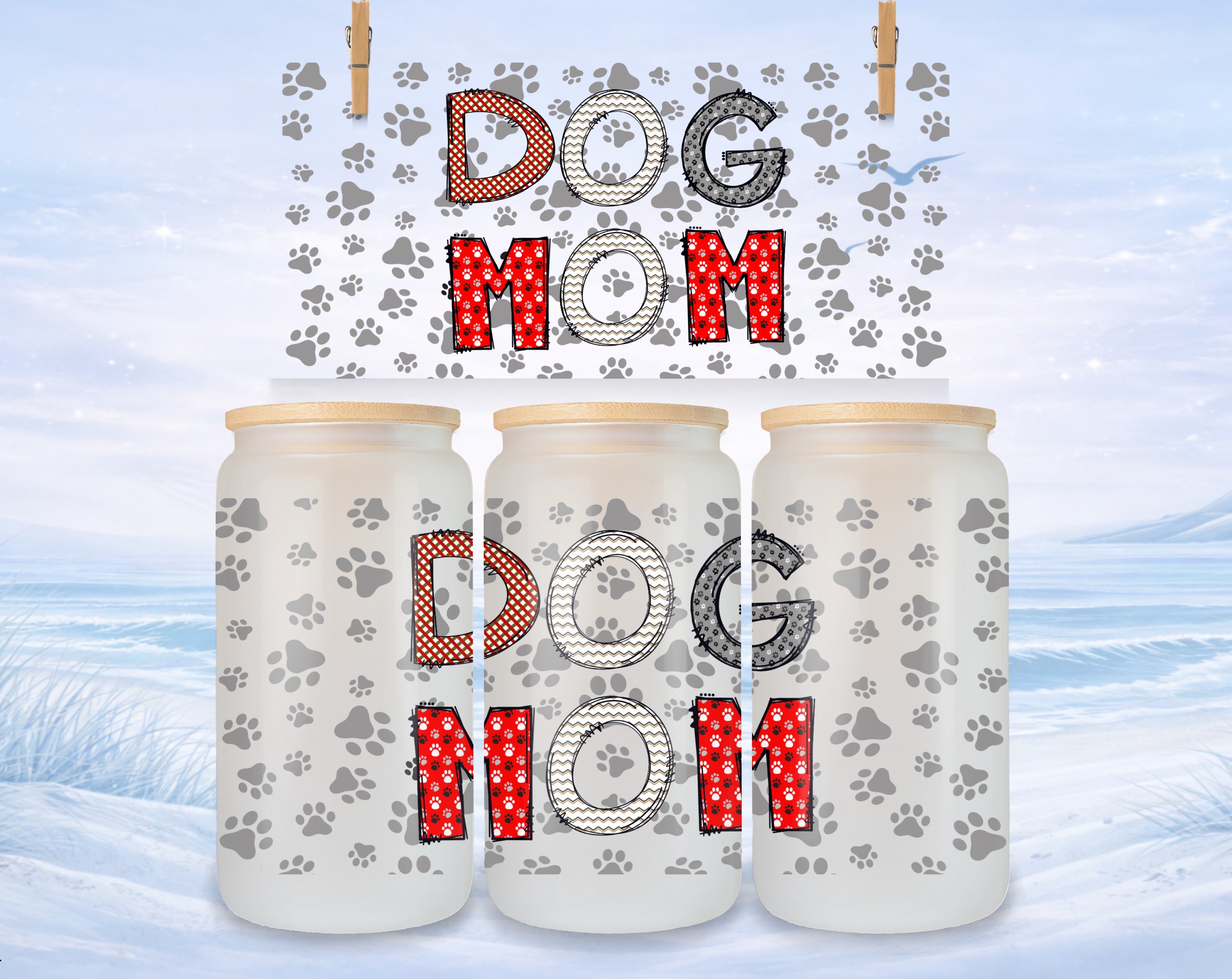 Three glass cans with "DOG MOM" text in paw print patterns.