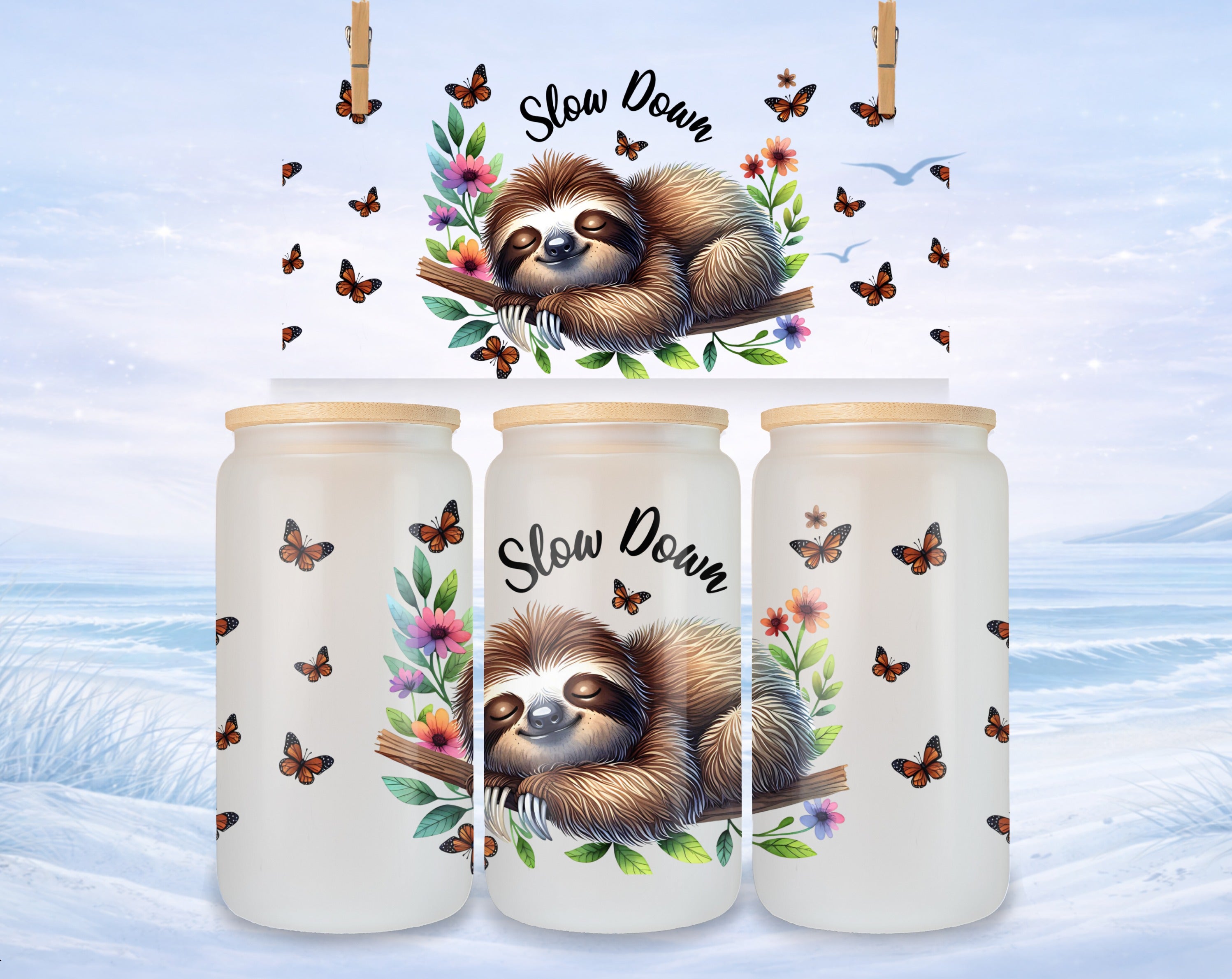 Sloth on branch with butterflies and "Slow Down" text on frosted glass tumbler.