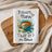 Tea towel with "Today's Menu: Eat It or Starve" and tomato soup graphic.