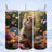 Tabby kitten looking up in a vibrant meadow with butterflies and flowers.