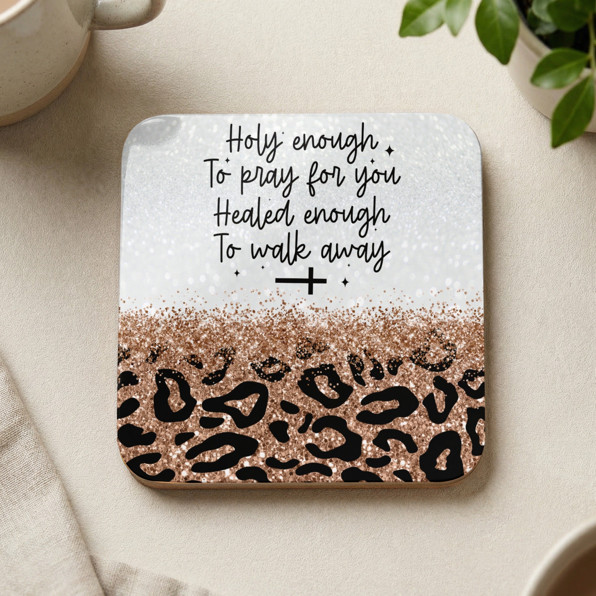 Square coaster with leopard print and text "Holy enough to pray for you. Healed enough to walk away."