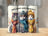 Three cats in winter hats and scarves with glasses, "CATS MAKE LIFE PURRRFECT" text.
