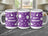 Purple mug with white "Happy Birthday" text and festive balloons.