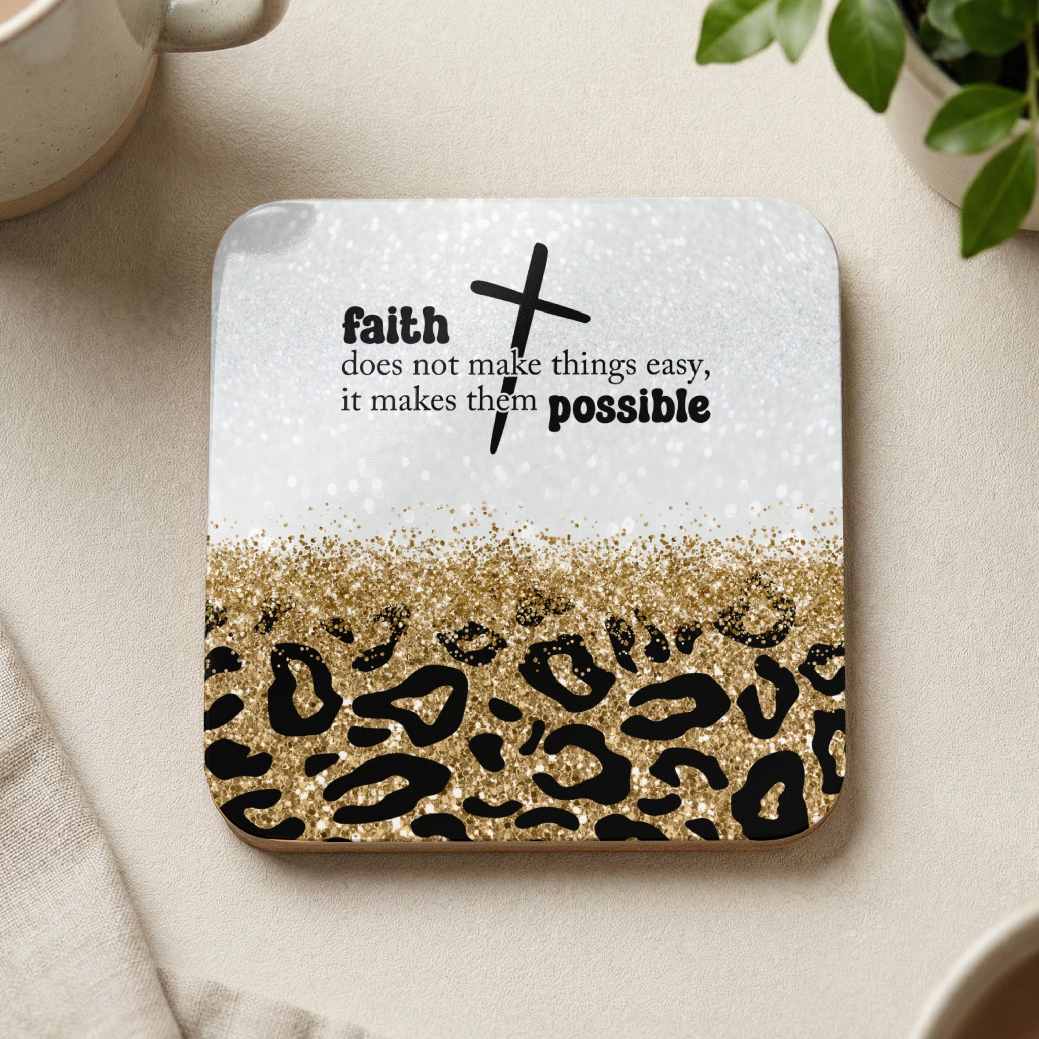 Coaster with leopard print, gold glitter, and "faith does not make things easy, it makes them possible" text.