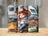 Cartoon girl in cowboy hat with wine sits by campfire.