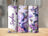 Hummingbirds and butterflies on a purple floral tumbler with "Sophia" text.