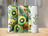 Three tumblers with kiwi fruit and floral designs, one with the name "Bailey".
