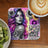 Woman with vibrant hair and floral tattoos on coaster with "YOU ARE ENOUGH" text.