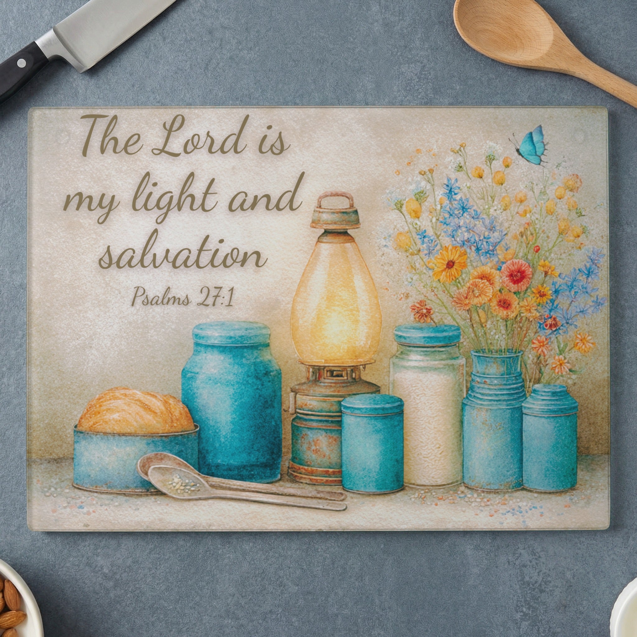 Glass cutting board with "The Lord is my light and salvation" text and floral design.