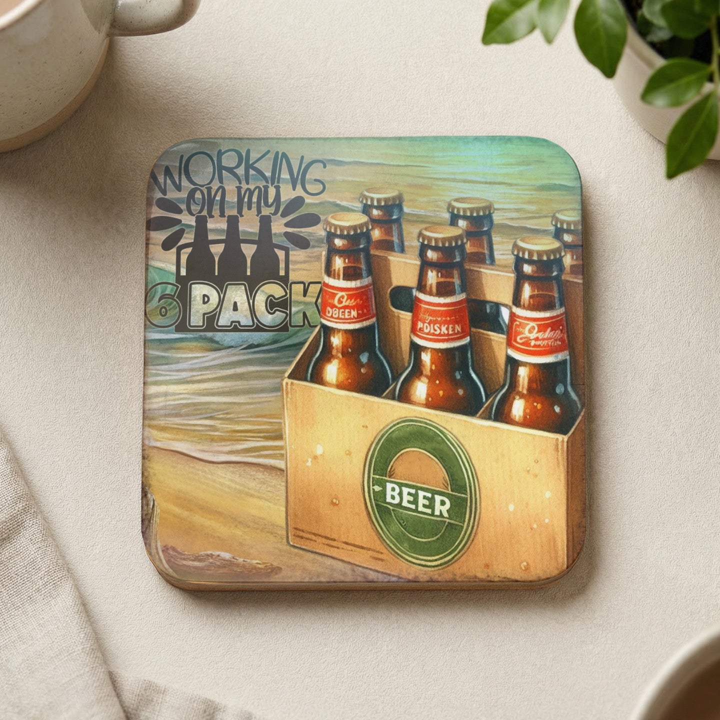 Cardboard beer carrier with six bottles of beer on a beach background.