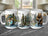 Three mugs featuring fishing scenes with fish, a bear, and a cabin.