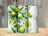 Three tall tumblers with green lime and leaf design.