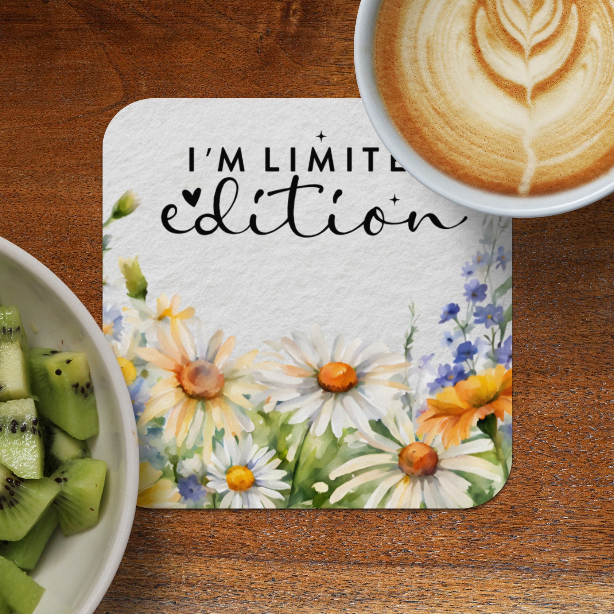 Coaster with text "I'M LIMIT ed[❤] edition" surrounded by watercolor daisies.