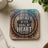 Coaster with "Whiskey Never Broke My Heart" text inside a barrel design.