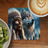 Native American man and wolf artwork on placemat with coffee and kiwi.