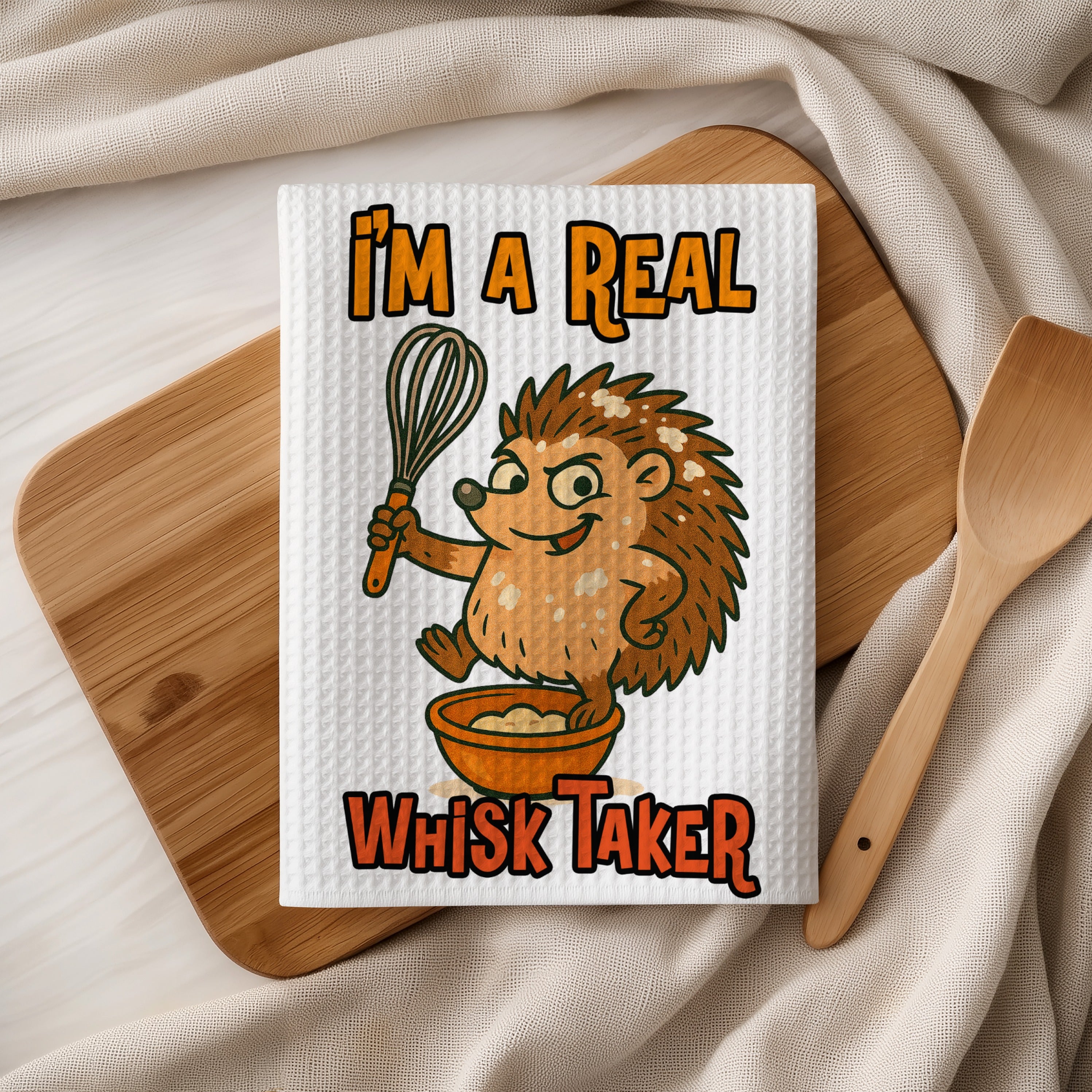 Hedgehog holding a whisk above a bowl with text "I'm a real whisk taker".