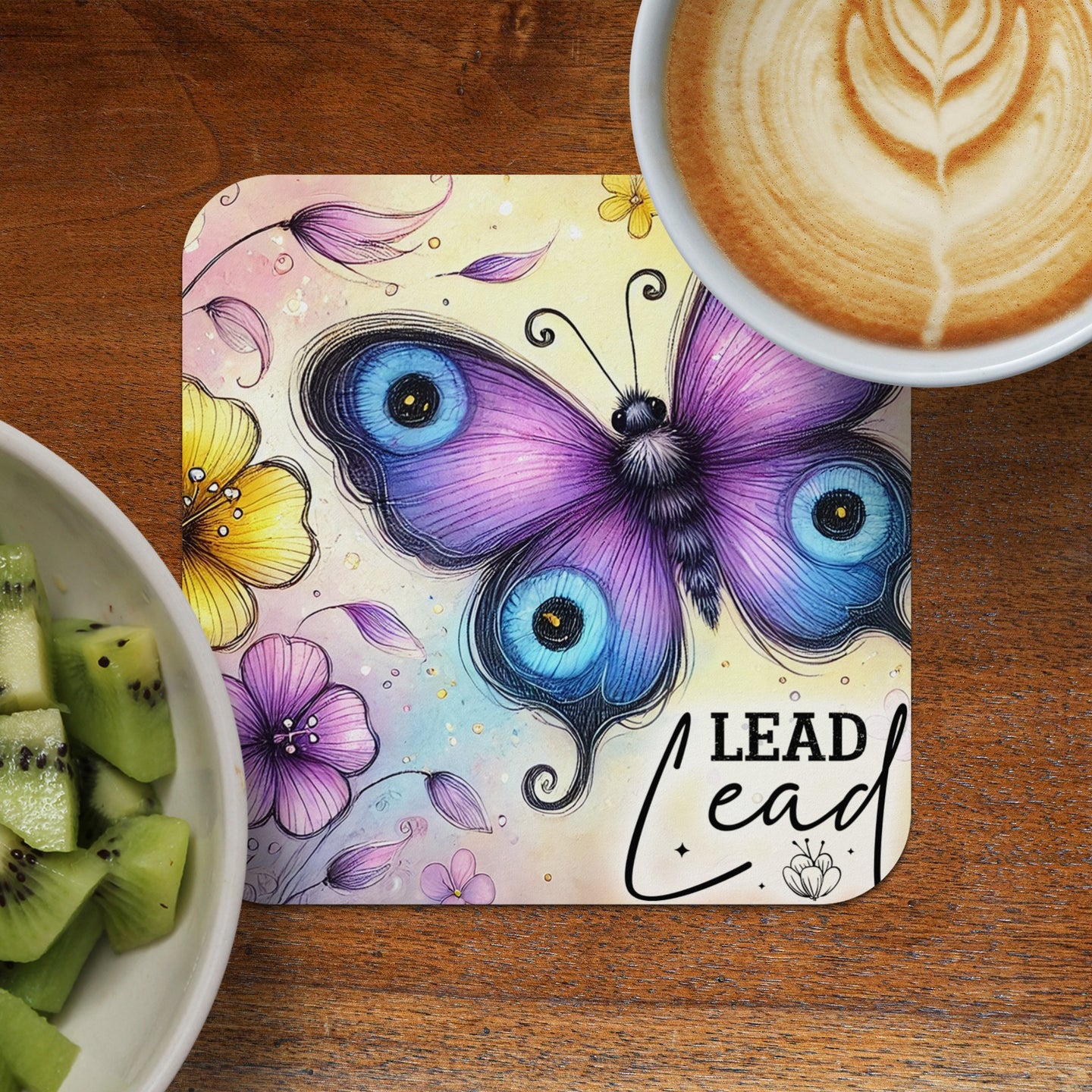 Butterfly illustration with "LEAD" text, alongside coffee and kiwi.