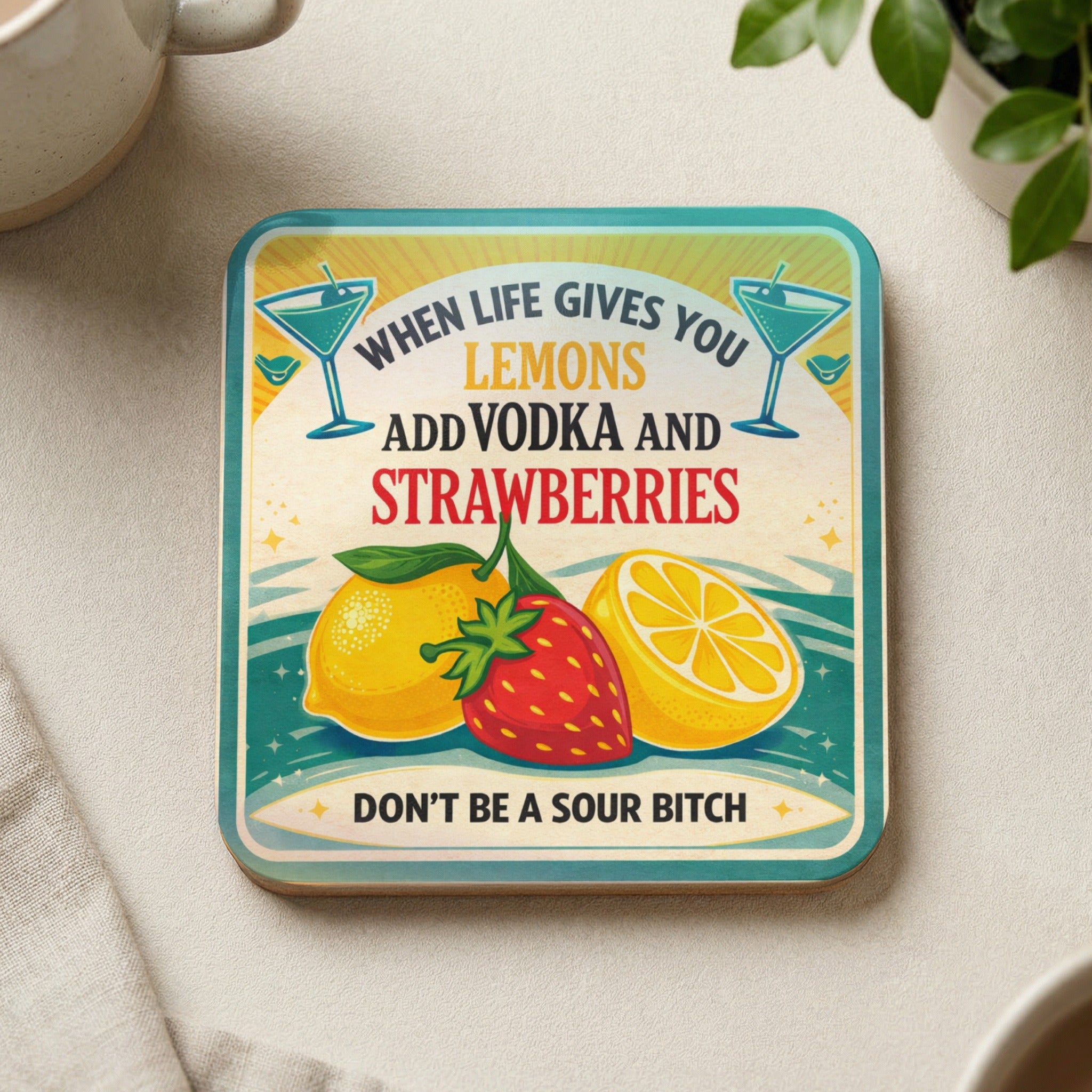 Coaster with lemons, strawberries, and text about vodka.