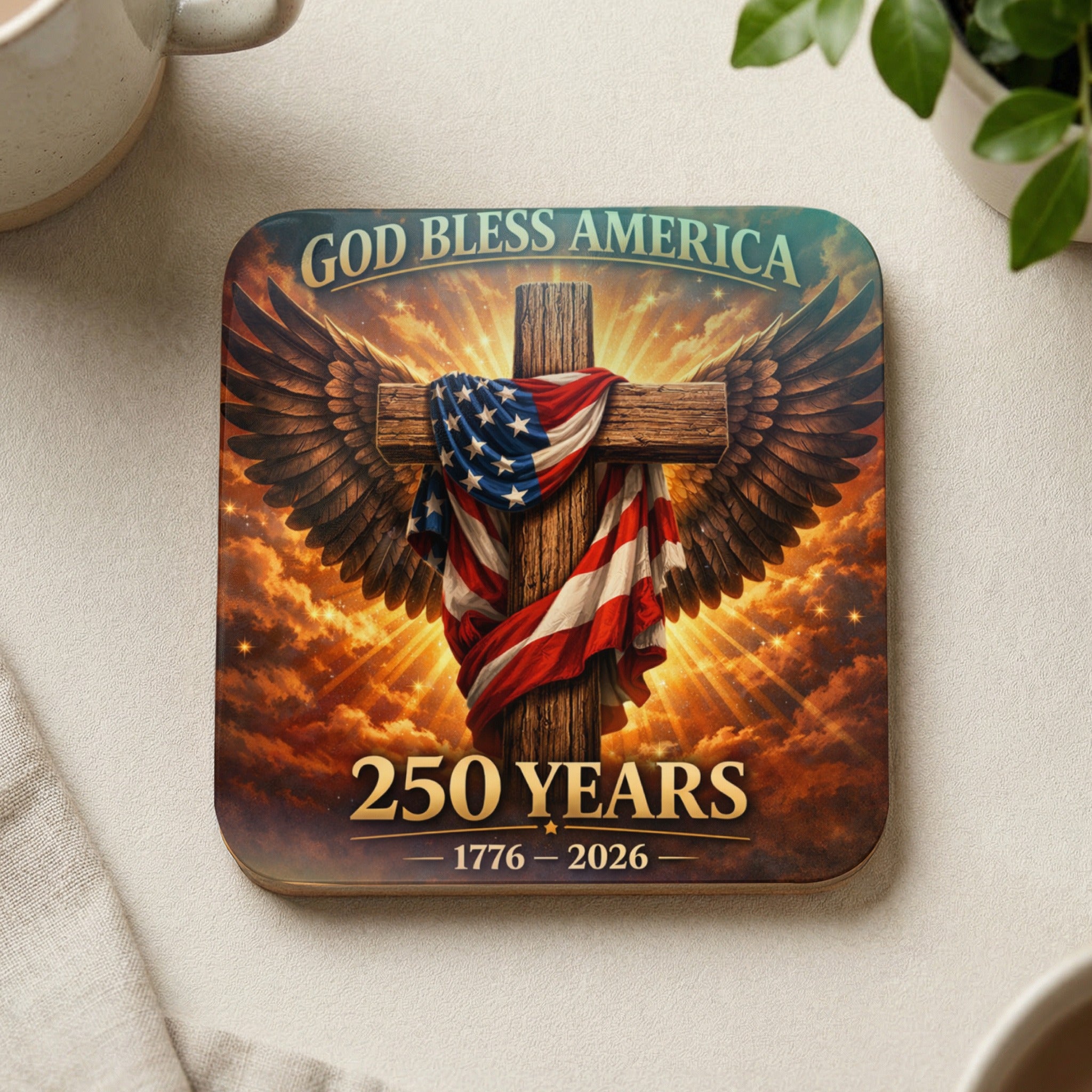 Cross with American flag, wings, and "God Bless America 250 Years 1776 - 2026".