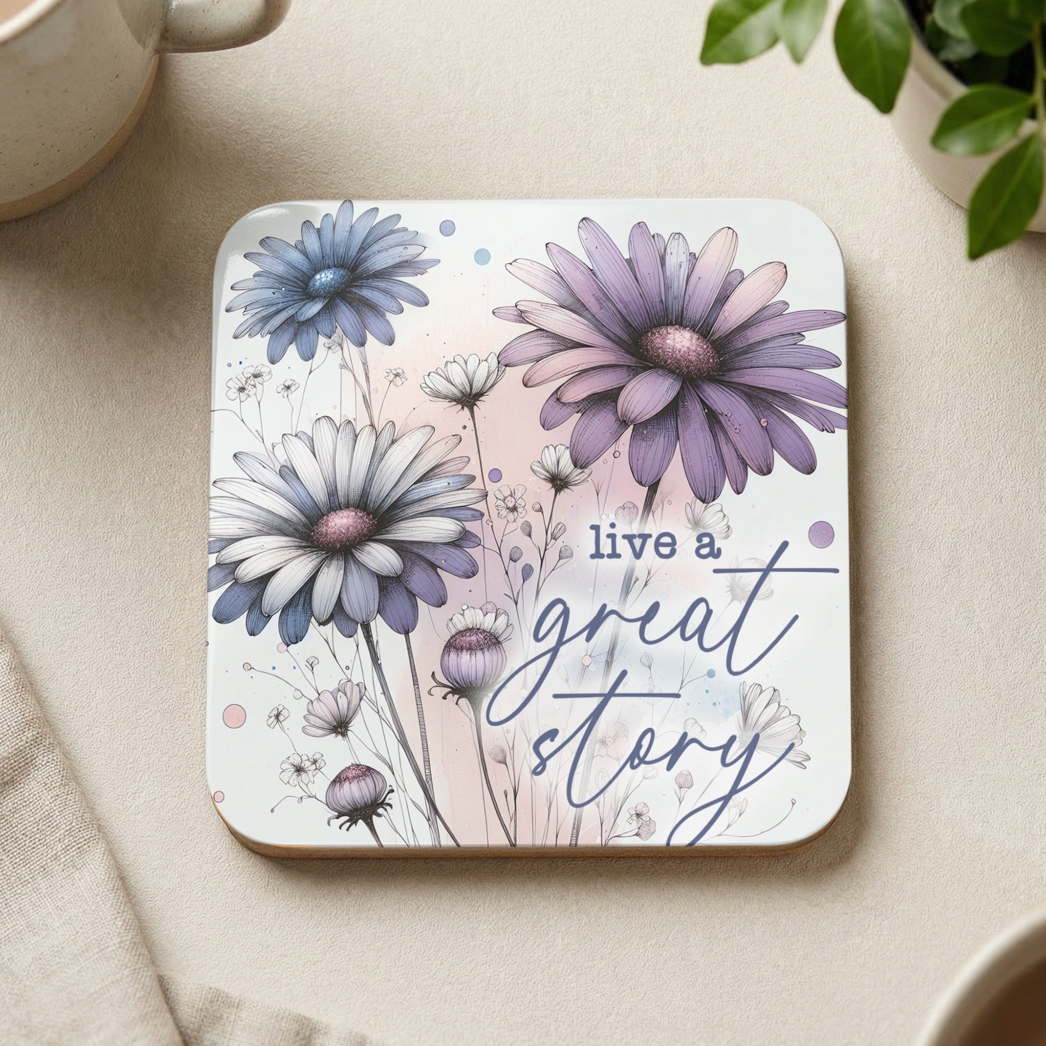 Coaster with purple and white daisies and text "live a great story."